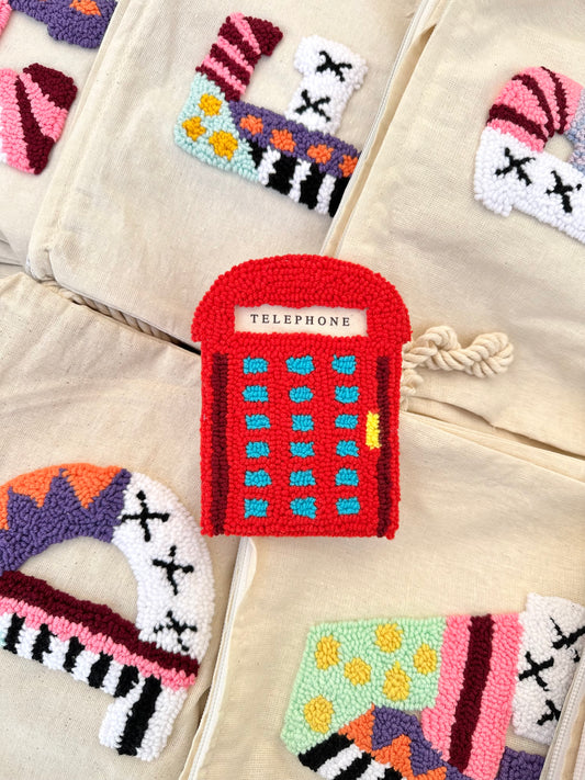Telephone booth coaster