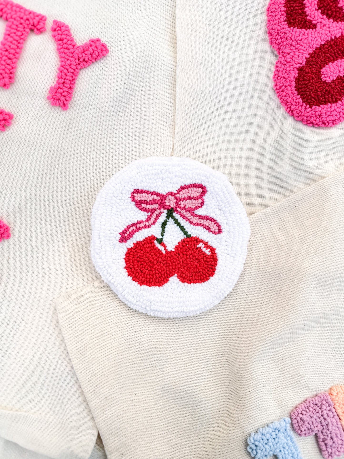 Cherry bow coaster