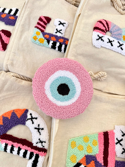 Pink evil eye coaster