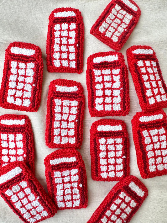 Telephone booth magnet
